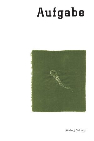 cover for Afugabe Number 3, Fall 2003. White background with the image of a square piece of camo green fabric. A tadpole is embroidered into the center of the fabric square with light green, almost white thread.
